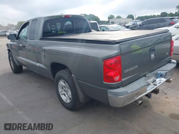 2006 Dodge Dakota SLT with VIN 1D7HE42N56S666276, listed as a IAAI auction lot 42697072 with 86,349 mi miles and . Bid and sale history available at DreamBid. Image 3.