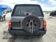 ✅ 2002 Suzuki Vitara JLS • VIN: 2S3TC52C526103788 • Лот: 80446185. Опубликован ранее на Copart с пробегом 85 742 миль. Бесплатный доступ к архиву аукционных продаж из США и подробный отчёт об истории автомобиля на DreamBid. Изображение 6.