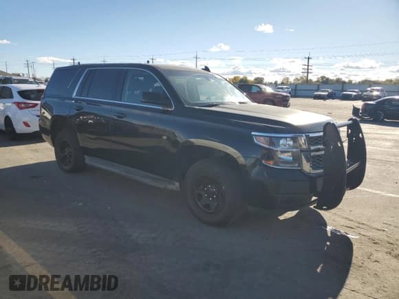 ✅ 2015 Chevrolet Tahoe Commercial • VIN: 1GNLC2EC3FR575336 • Lot: 90258435. Listed on Copart with 148,079 mi. Free auction sales archive from the USA and detailed vehicle history report at DreamBid. Image 4.