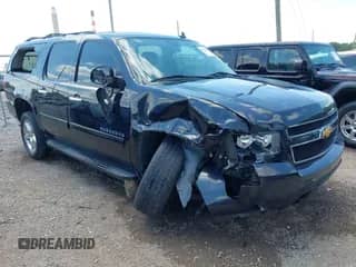 2012 Chevrolet Suburban LT z VIN 1GNSKJE72CR163433, wystawiony jako IAAI lot #42951300 z przebiegiem 244 156 mil mil oraz . Historia ofert i sprzedaży dostępna na DreamBid. Obrazek 1.