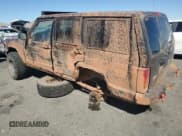 ✅ 2000 Jeep Cherokee • VIN: 1J4FF48S6YL166145 • Lot: 85129215. Wystawiony na Copart z przebiegiem 186 626 mil. Bezpłatny archiwum sprzedaży aukcyjnych z USA i szczegółowy raport historii pojazdu na DreamBid. Zdjęcie 2.