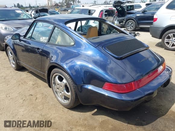 ✅ 1994 Porsche 911 • VIN: WP0AB2964RS420363 • Лот: 42097800. Опубликован ранее на IAAI с пробегом 99 635 миль. Бесплатный доступ к архиву аукционных продаж из США и подробный отчёт об истории автомобиля на DreamBid. Изображение 3.