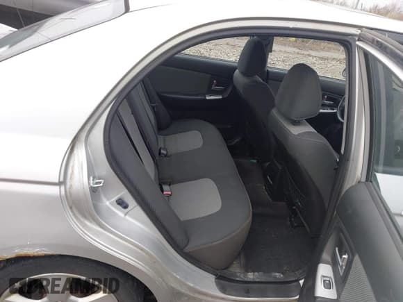 ✅ 2009 Kia Spectra EX • VIN: KNAFE222095027380 • Lot: 43730880. Listed on IAAI with 200,112 mi. Free auction sales archive from the USA and detailed vehicle history report at DreamBid. Image 8.