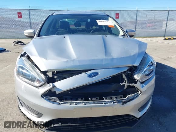 ✅ 2018 Ford Focus SE • VIN: 1FADP3FE7JL286226 • Lot: 43619631. Wystawiony na IAAI z przebiegiem 97 842 mil. Bezpłatny archiwum sprzedaży aukcyjnych z USA i szczegółowy raport historii pojazdu na DreamBid. Zdjęcie 6.