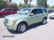✅ 2009 Ford Escape Hybrid • VIN: 1FMCU49329KA08605 • Lot: 42367265. Listed on IAAI with 166,562 mi. Free auction sales archive from the USA and detailed vehicle history report at DreamBid. Image 2.