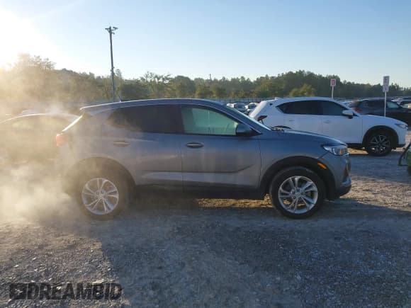 ✅ 2023 Buick Encore GX Preferred • VIN: KL4MMBS26PB083281 • Lot: 43594114. Listed on IAAI with 53,684 mi. Free auction sales archive from the USA and detailed vehicle history report at DreamBid. Image 13.