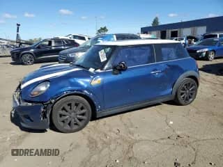 2016 MINI Hardtop with VIN WMWXP5C5XG2D13540, listed as a Copart auction lot 84736905 with 144,289 mi miles and Clean title. Bid and sale history available at DreamBid. Image 1.