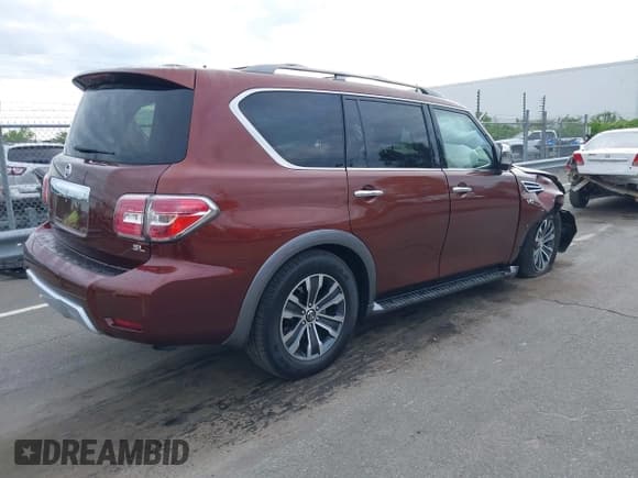 ✅ 2018 Nissan Armada SL • VIN: JN8AY2ND0J9052718 • Lot: 42088571. Listed on IAAI with 61,671 mi. Free auction sales archive from the USA and detailed vehicle history report at DreamBid. Image 4.