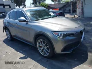 ✅ 2018 Alfa Romeo Stelvio • VIN: ZASFAKAN1J7B91604 • Lot: 42164492. Wystawiony na IAAI z przebiegiem Nie podano. Bezpłatny archiwum sprzedaży aukcyjnych z USA i szczegółowy raport historii pojazdu na DreamBid. Zdjęcie 1.