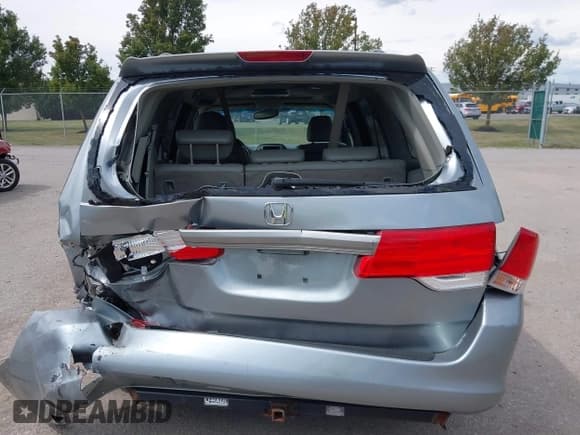 ✅ 2008 Honda Odyssey EX-L • VIN: 5FNRL38738B084846 • Lot: 43088119. Listed on IAAI with 198,113 mi. Free auction sales archive from the USA and detailed vehicle history report at DreamBid. Image 16.