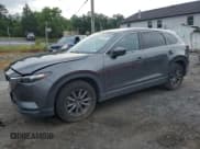 ✅ 2020 Mazda CX-9 Sport • VIN: JM3TCBBY1L0400034 • Lot: 63270225. Listed on Copart with 46,325 mi. Free auction sales archive from the USA and detailed vehicle history report at DreamBid. Image 1.