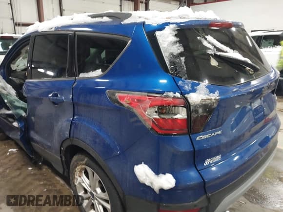 ✅ 2017 Ford Escape SE • VIN: 1FMCU9GD7HUA12869 • Lot: 43802031. Listed on IAAI with Not provided. Free auction sales archive from the USA and detailed vehicle history report at DreamBid. Image 20.