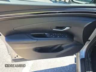 2024 Hyundai Tucson SEL with VIN 5NMJBCDE8RH387920, listed as a IAAI auction lot 42910791 with 24,597 mi miles and . Bid and sale history available at DreamBid. Image 1.