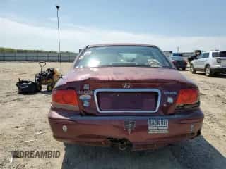 2003 Hyundai Sonata z VIN KMHWF25S13A742173, wystawiony jako Copart lot #53027605 z przebiegiem 140 832 mil mil oraz Czysty tytuł • Clean title. Historia ofert i sprzedaży dostępna na DreamBid. Obrazek 6.