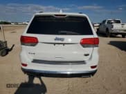 ✅ 2014 Jeep Grand Cherokee Summit • VIN: 1C4RJFJT1EC406889 • Lot: 87266965. Listed on Copart with 106,215 mi. Free auction sales archive from the USA and detailed vehicle history report at DreamBid. Image 6.