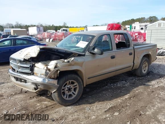 ✅ 2003 Dodge Dakota SLT • VIN: 1D7HL48X53S348636 • Lot: 41329221. Wystawiony na IAAI z przebiegiem 133 075 mil. Bezpłatny archiwum sprzedaży aukcyjnych z USA i szczegółowy raport historii pojazdu na DreamBid. Zdjęcie 2.