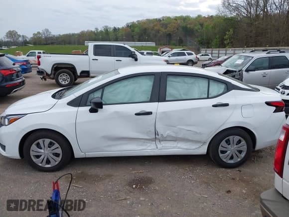 ✅ 2023 Nissan Versa S • VIN: 3N1CN8DV2PL823144 • Lot: 41945612. Listed on IAAI with 21,126 mi. Free auction sales archive from the USA and detailed vehicle history report at DreamBid. Image 14.