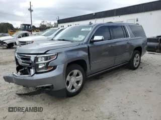 2020 Chevrolet Suburban Premier z VIN 1GNSCJKC3LR140399, wystawiony jako Copart lot #77262944 z przebiegiem 69 901 mil mil oraz Szkoda całkowita • Salvage title. Historia ofert i sprzedaży dostępna na DreamBid. Obrazek 1.