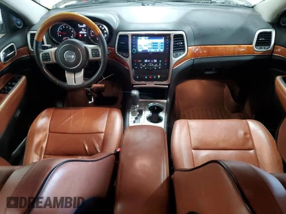 ✅ 2012 Jeep Grand Cherokee Overland • VIN: 1C4RJFCG7CC324310 • Lot: 84262345. Listed on Copart with 155,354 mi. Free auction sales archive from the USA and detailed vehicle history report at DreamBid. Image 8.