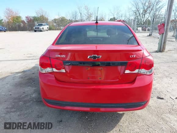 2013 Chevrolet Cruze LTZ z VIN 1G1PG5SB7D7245731, wystawiony jako IAAI lot #43565113 z przebiegiem 125 022 mil mil oraz . Historia ofert i sprzedaży dostępna na DreamBid. Obrazek 16.