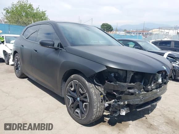 ✅ 2022 BMW iX xDrive50 • VIN: WB523CF00NCK55340 • Лот: 42018610. Опубликован ранее на IAAI с пробегом 54 778 миль. Бесплатный доступ к архиву аукционных продаж из США и подробный отчёт об истории автомобиля на DreamBid. Изображение 1.