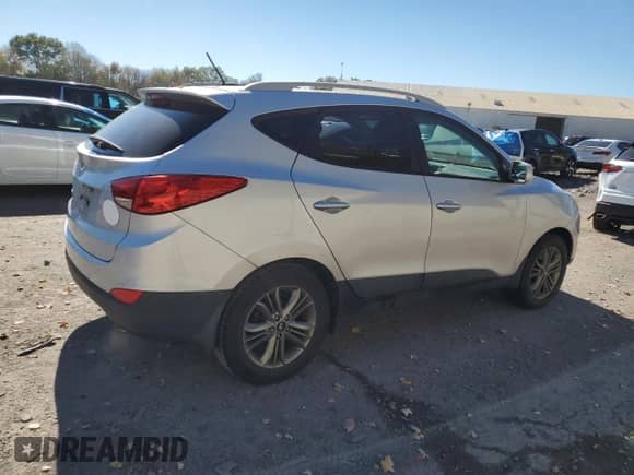 2014 Hyundai Tucson SE z VIN KM8JU3AG1EU824431, wystawiony jako Copart lot #82543985 z przebiegiem 124 792 mil mil oraz Czysty tytuł • Clean title. Historia ofert i sprzedaży dostępna na DreamBid. Obrazek 3.