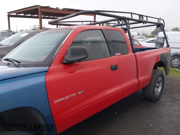 2002 Dodge Dakota SLT with VIN 1B7GL42N52S505626, listed as a IAAI auction lot 41552396 with 255,927 mi miles and . Bid and sale history available at DreamBid. Image 14.