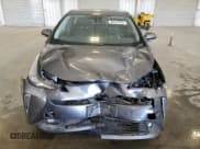 ✅ 2021 Toyota Prius LE • VIN: JTDL9MFU2M3023742 • Lot: 82576745. Listed on Copart with 121,819 mi. Free auction sales archive from the USA and detailed vehicle history report at DreamBid. Image 5.