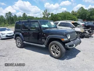 ✅ 2021 Jeep Wrangler Unlimited Sahara • VIN: 1C4HJXEN9MW681422 • Lot: 42563426. Listed on IAAI with 48,582 mi. Free auction sales archive from the USA and detailed vehicle history report at DreamBid. Image 1.