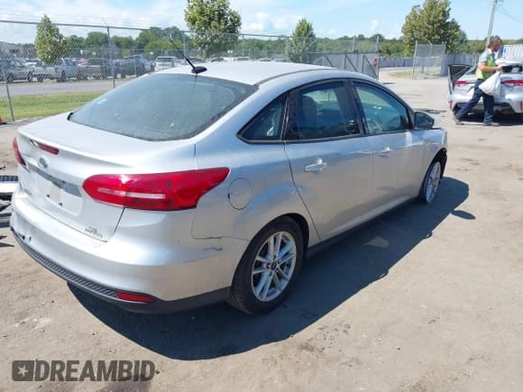 ✅ 2015 Ford Focus SE • VIN: 1FADP3F22FL365462 • Lot: 43138828. Listed on IAAI with 112,015 mi. Free auction sales archive from the USA and detailed vehicle history report at DreamBid. Image 4.