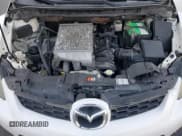 ✅ 2008 Mazda CX-7 Grand Touring • VIN: JM3ER29LX80202822 • Лот: 93779275. Опубликован ранее на Copart с пробегом 100 265 миль. Бесплатный доступ к архиву аукционных продаж из США и подробный отчёт об истории автомобиля на DreamBid. Изображение 12.