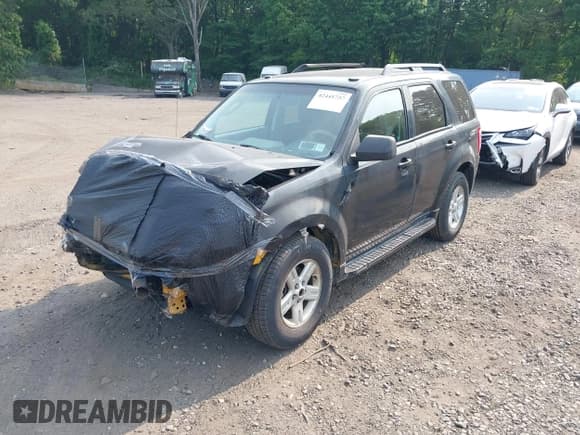 ✅ 2011 Ford Escape Hybrid • VIN: 1FMCU4K37BKA45651 • Lot: 42441757. Listed on IAAI with 504,073 mi. Free auction sales archive from the USA and detailed vehicle history report at DreamBid. Image 2.