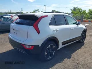 ✅ 2023 Kia Niro Wind • VIN: KNDCR3L17P5076353 • Лот: 43029439. Опубликован ранее на IAAI с пробегом 21 188 миль. Бесплатный доступ к архиву аукционных продаж из США и подробный отчёт об истории автомобиля на DreamBid. Изображение 4.