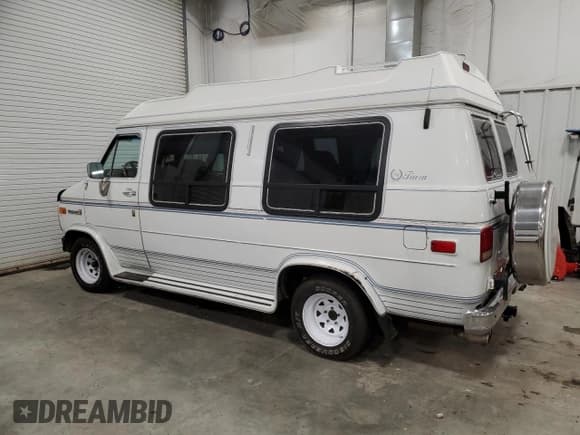 ✅ 1990 GMC Vandura • VIN: 1GDEG25K8L7521773 • Lot: 84875104. Listed on Copart with 171,457 mi. Free auction sales archive from the USA and detailed vehicle history report at DreamBid. Image 2.