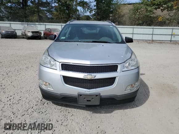 ✅ 2012 Chevrolet Traverse LS • VIN: 1GNKVFED1CJ139021 • Lot: 74534904. Wystawiony na Copart z przebiegiem 159 808 mil. Bezpłatny archiwum sprzedaży aukcyjnych z USA i szczegółowy raport historii pojazdu na DreamBid. Zdjęcie 5.
