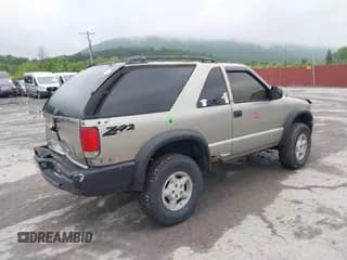 ✅ 2000 Chevrolet Blazer LS • VIN: 1GNCT18W7YK161195 • Lot: 42329599. Wystawiony na IAAI z przebiegiem 122 834 mil. Bezpłatny archiwum sprzedaży aukcyjnych z USA i szczegółowy raport historii pojazdu na DreamBid. Zdjęcie 4.