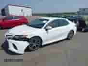 2020 Toyota Camry SE with VIN 4T1G11BK3LU007582, listed as a IAAI auction lot 42414113 with 113,925 mi miles and . Bid and sale history available at DreamBid. Image 2.