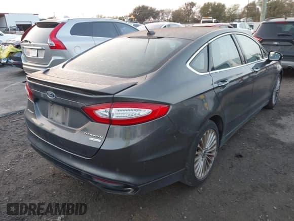 ✅ 2016 Ford Fusion Titanium • VIN: 3FA6P0K9XGR117621 • Lot: 43780558. Listed on IAAI with 144,994 mi. Free auction sales archive from the USA and detailed vehicle history report at DreamBid. Image 4.