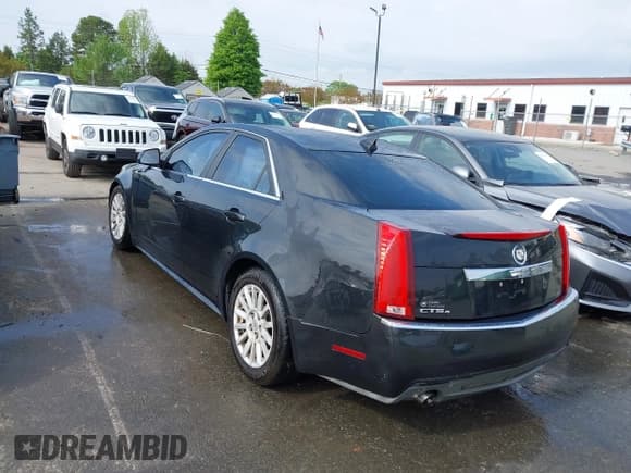 ✅ 2013 Cadillac CTS Luxury • VIN: 1G6DG5E56D0115726 • Lot: 41996717. Listed on IAAI with 216,011 mi. Free auction sales archive from the USA and detailed vehicle history report at DreamBid. Image 3.