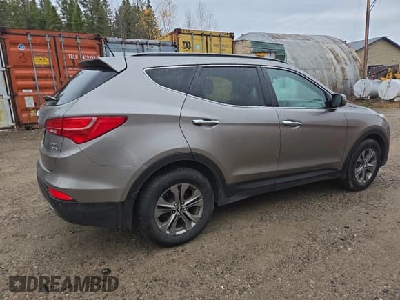 ✅ 2014 Hyundai Santa Fe • VIN: 5XYZUDLB7EG216493 • Лот: 85315085. Опубликован ранее на Copart с пробегом 125 054 миль. Бесплатный доступ к архиву аукционных продаж из США и подробный отчёт об истории автомобиля на DreamBid. Изображение 3.