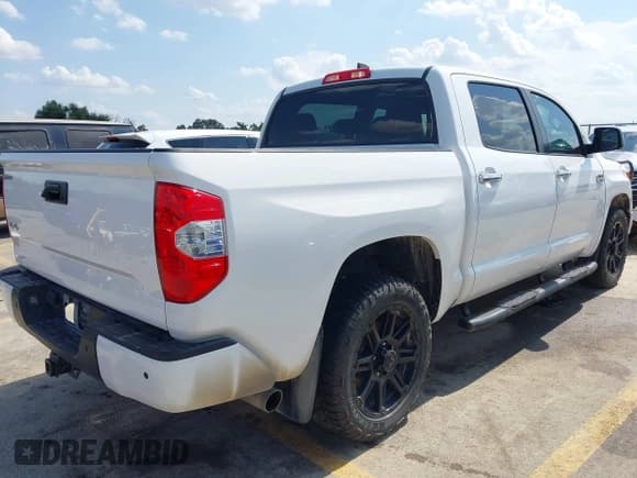 ✅ 2020 Toyota Tundra Platinum • VIN: 5TFAY5F11LX911590 • Lot: 42996748. Listed on IAAI with 84,932 mi. Free auction sales archive from the USA and detailed vehicle history report at DreamBid. Image 4.