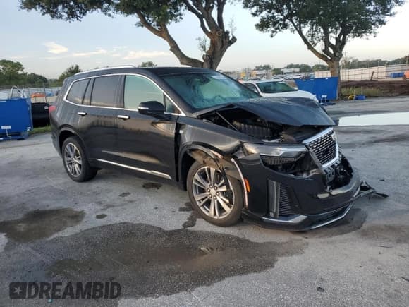 ✅ 2021 Cadillac XT6 Premium Luxury • VIN: 1GYKPCRS7MZ103504 • Lot: 67899385. Listed on Copart with 120,670 mi. Free auction sales archive from the USA and detailed vehicle history report at DreamBid. Image 4.