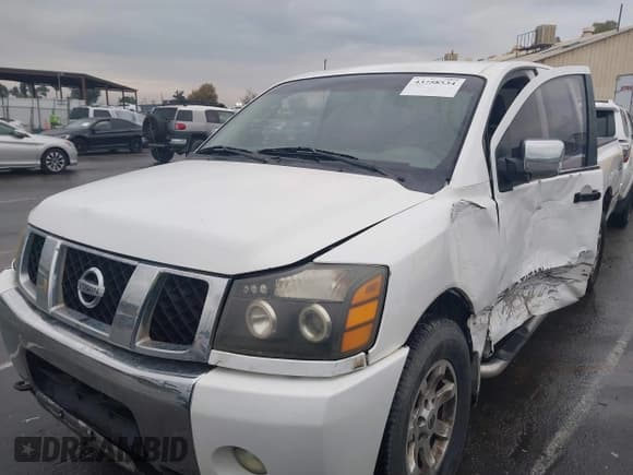 ✅ 2005 Nissan Titan SE • VIN: 1N6AA07B15N521468 • Lot: 43758534. Listed on IAAI with Not provided. Free auction sales archive from the USA and detailed vehicle history report at DreamBid. Image 2.