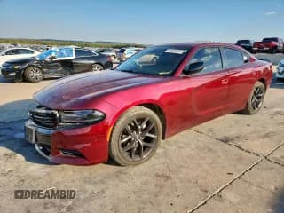 ✅ 2021 Dodge Charger SXT • VIN: 2C3CDXBG9MH556897 • Lot: 84626605. Wystawiony na Copart z przebiegiem 72 456 mil. Bezpłatny archiwum sprzedaży aukcyjnych z USA i szczegółowy raport historii pojazdu na DreamBid. Zdjęcie 1.