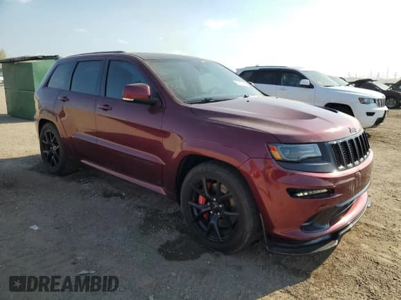 ✅ 2016 Jeep Grand Cherokee SRT • VIN: 1C4RJFDJ7GC503740 • Лот: 82157295. Опубликован ранее на Copart с пробегом 61 010 миль. Бесплатный доступ к архиву аукционных продаж из США и подробный отчёт об истории автомобиля на DreamBid. Изображение 4.