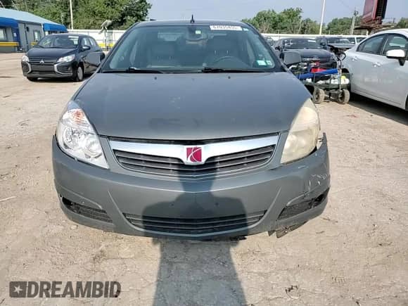 2009 Saturn Aura XR z VIN 1G8ZX577X9F119987, wystawiony jako Copart lot #67035455 z przebiegiem 179 054 mil mil oraz Szkoda całkowita • Salvage title. Historia ofert i sprzedaży dostępna na DreamBid. Obrazek 13.