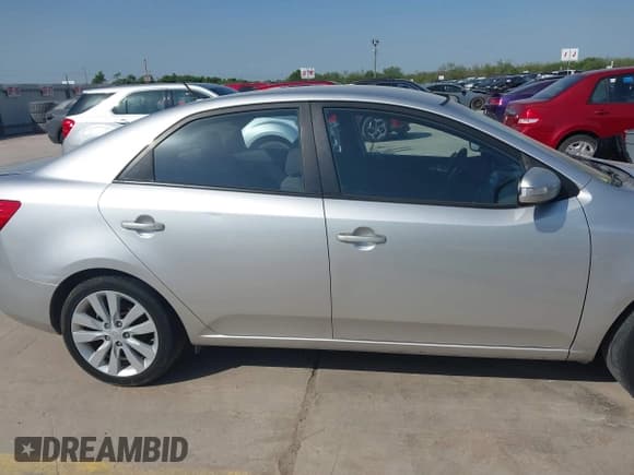 ✅ 2010 Kia Forte SX • VIN: KNAFW4A34A5116442 • Lot: 42202552. Listed on IAAI with 133,303 mi. Free auction sales archive from the USA and detailed vehicle history report at DreamBid. Image 13.