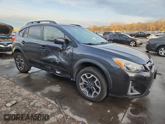 ✅ 2016 Subaru Crosstrek Premium • VIN: JF2GPABC6G8215208 • Lot: 91715835. Listed on Copart with 112,995 mi. Free auction sales archive from the USA and detailed vehicle history report at DreamBid. Image 4.