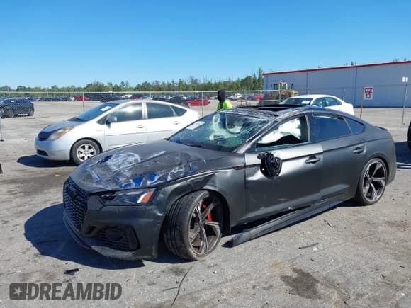 ✅ 2024 Audi RS 5 Sportback • VIN: WUAAWCF57RA902503 • Lot: 41768691. Wystawiony na IAAI z przebiegiem 2 450 mil. Bezpłatny archiwum sprzedaży aukcyjnych z USA i szczegółowy raport historii pojazdu na DreamBid. Zdjęcie 2.