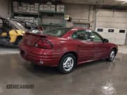 ✅ 2002 Pontiac Grand Am SE • VIN: 1G2NE52F92C291335 • Lot: 41665150. Listed on IAAI with 75,552 mi. Free auction sales archive from the USA and detailed vehicle history report at DreamBid. Image 4.
